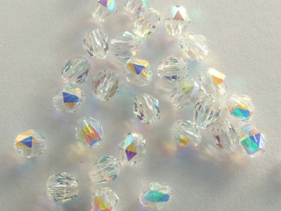 Swarovsk Triangular Facets 5025Clear Crystal Ab 4mm Oval Beads x 4